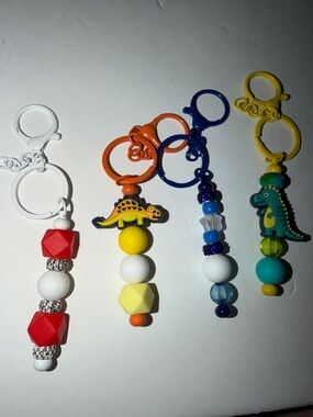 Colorful Dinosaur & Bead Keychain Bundle - Red, Yellow, Blue, Teal